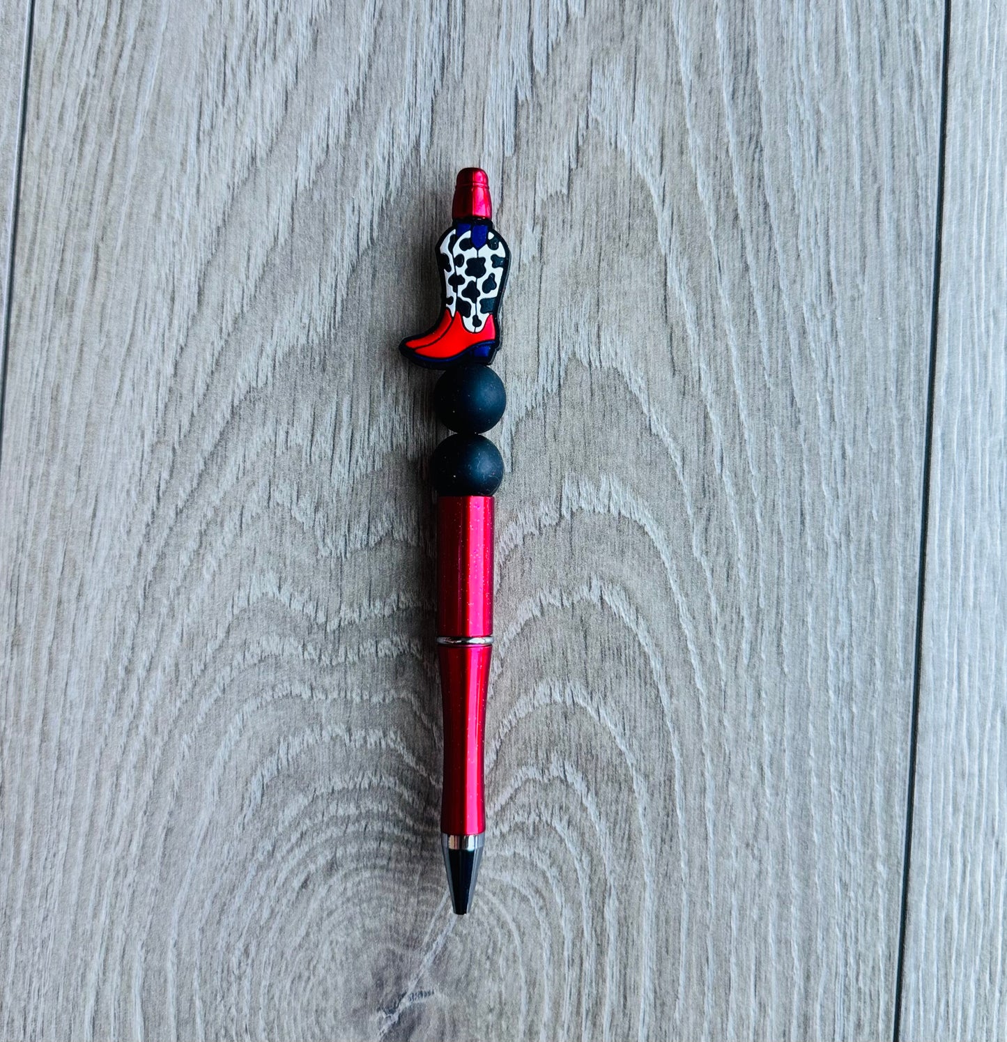 Cowprint boots Pen
