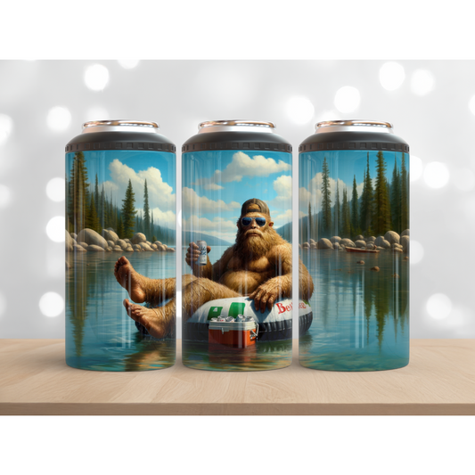 Three cans with a Sasquatch holding a beer against a nature-themed background